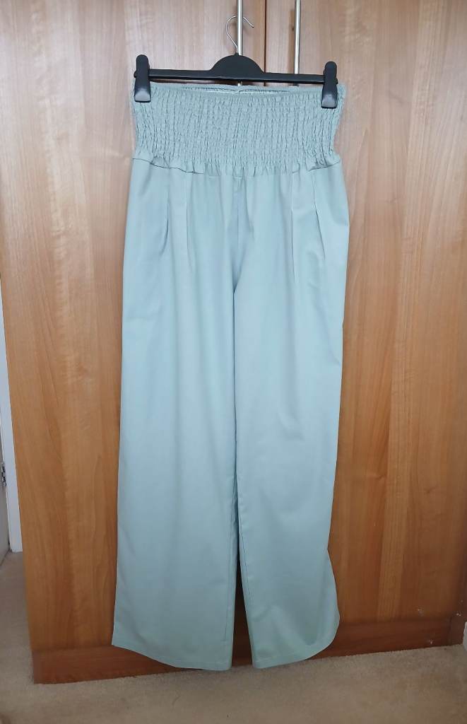 Women's green lightweight summer trousers 