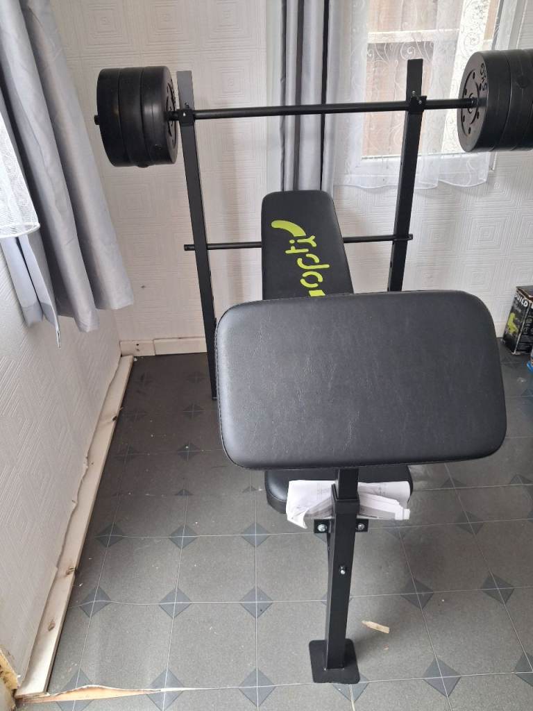 Optibench with 30kg weights 