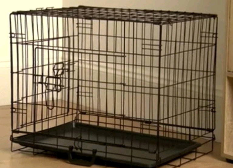 Double Door Dog CrateKeep your pet safe and secure with this resilie