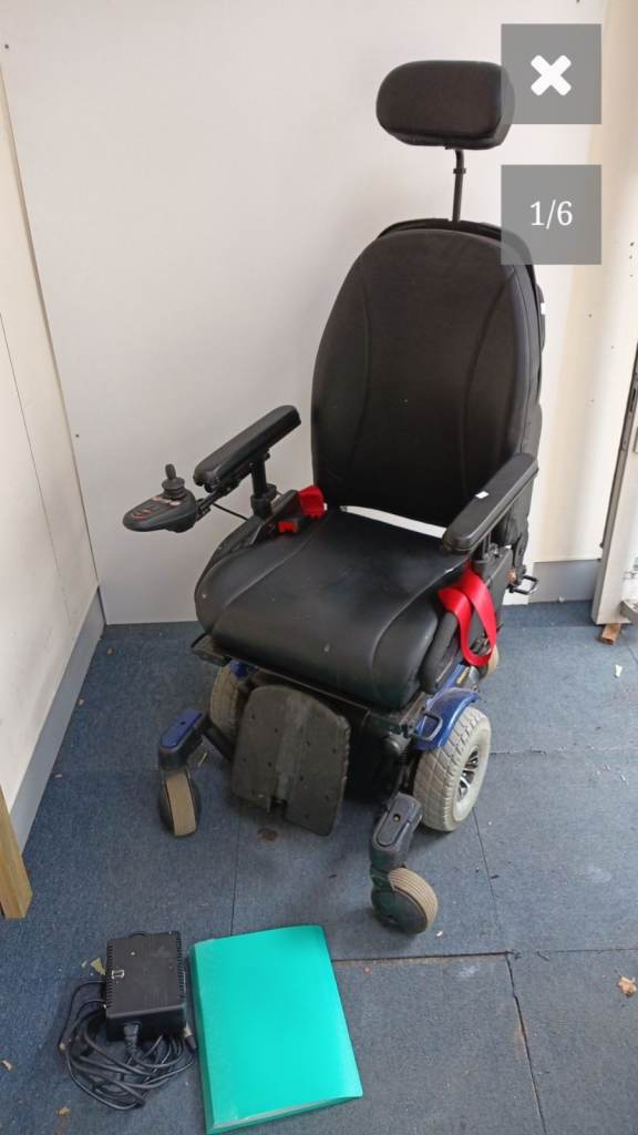 Quantum 610 Electric Wheelchair with Charger and Manual