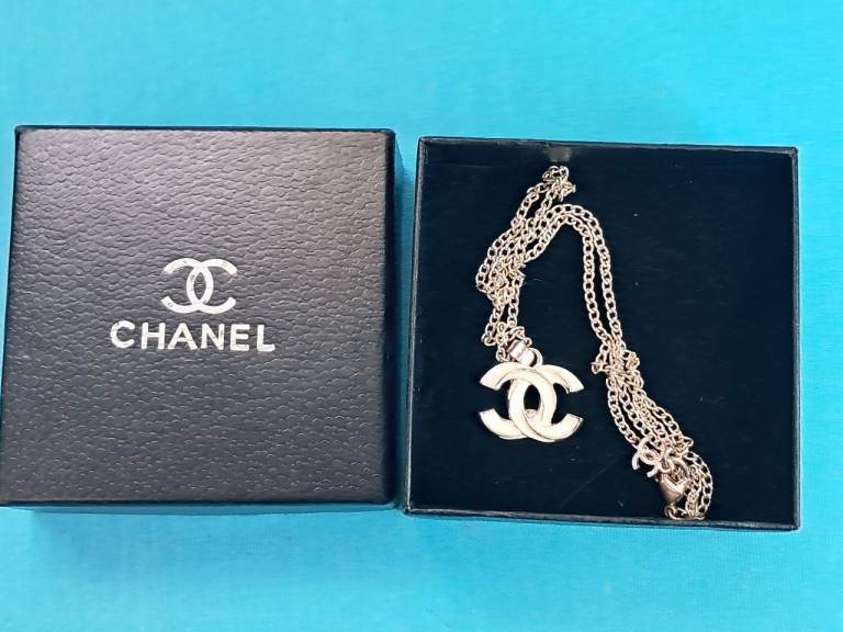 Beautiful logo costume jewellery necklace. 