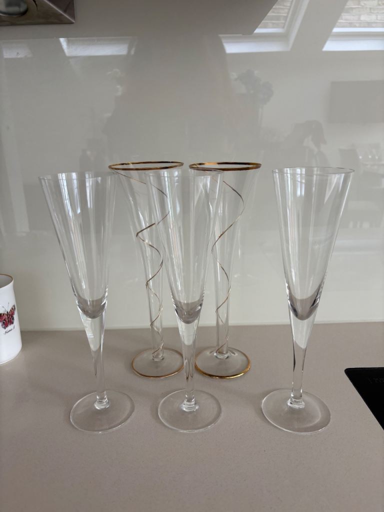5 champagne flutes. Collect from Fulham