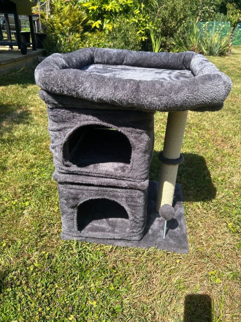 Cat scratching post with bed