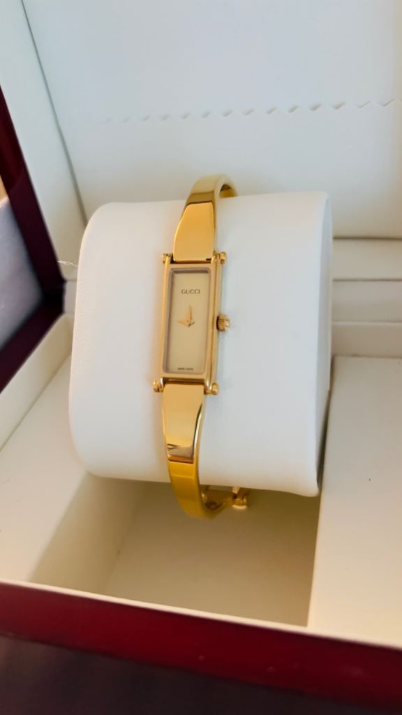 Ladies Gucci gold plated bangle watch. Model 1500