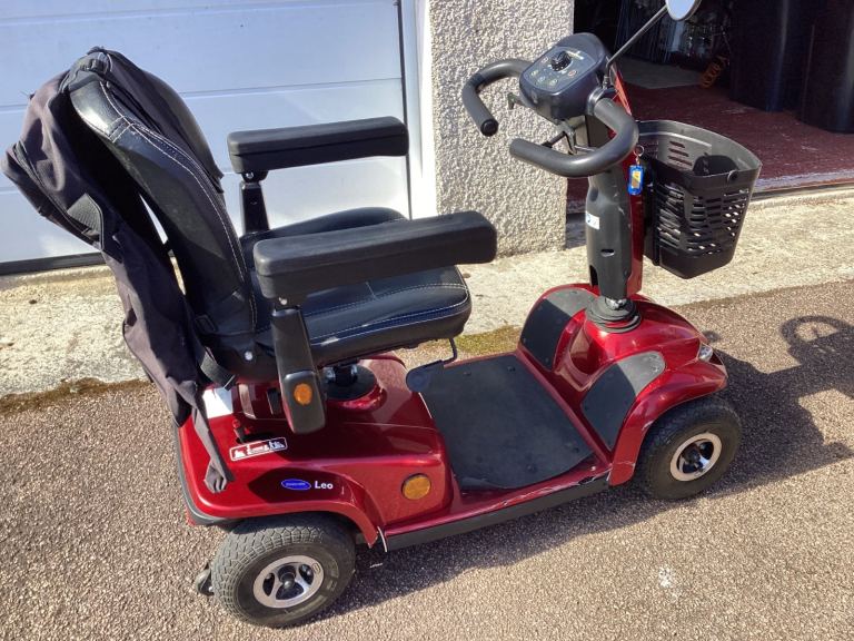Four wheeled Invercare electric mobility scooter