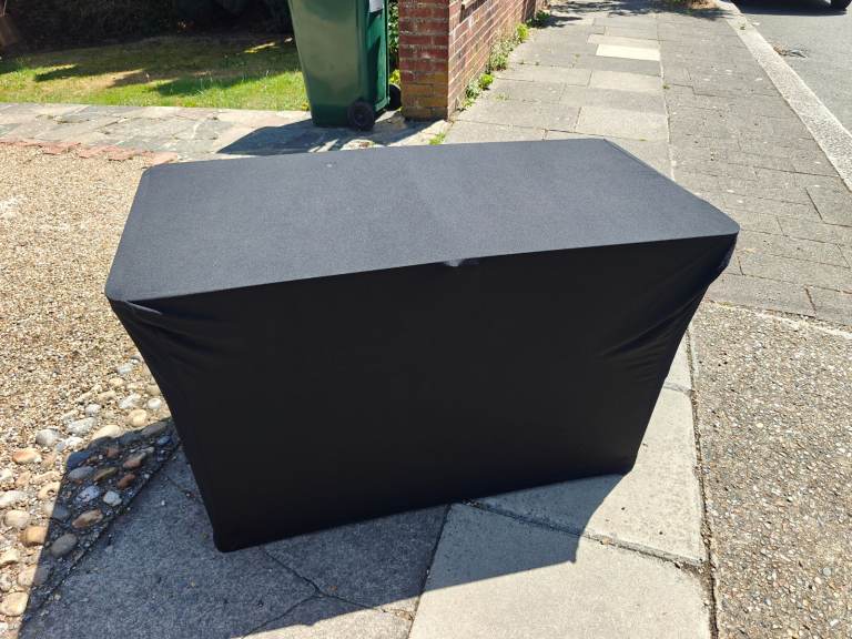 Foldable indoor outdoor event table trestle with fully fitted scrim