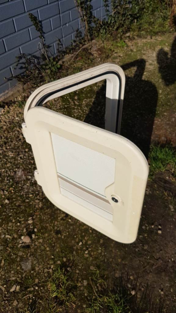 Various side doors with frames and keys for caravan camper motorhome - gas, toilet, storage.