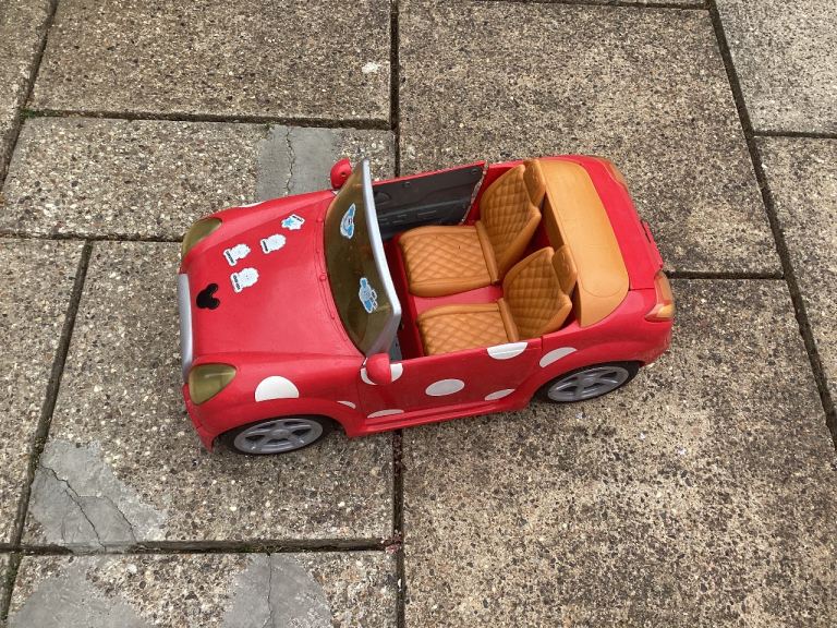 Red Toy Car with White Polka Dots – Good Condition