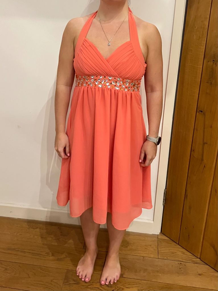 Really pretty Amelia peach colour prom dress size 8. 