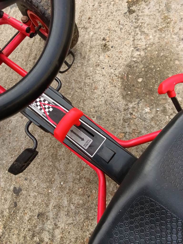 Childs pedal car forward and reverse