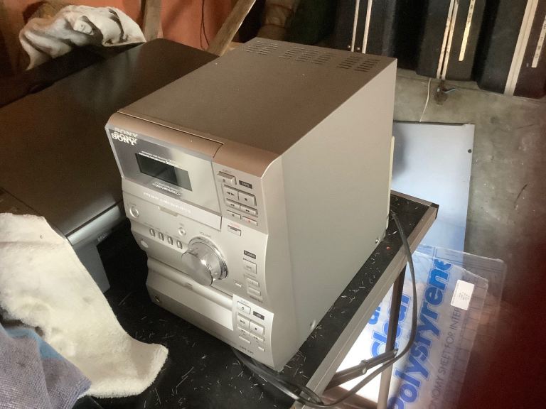 Under the counter freezer. And a Small Sony stereo