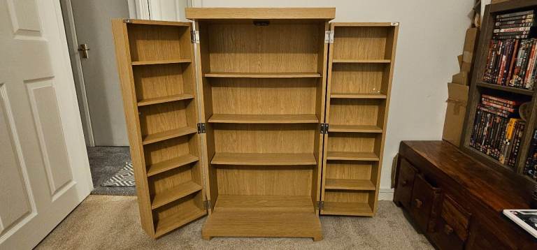 Pine storage unit with doors. Suitable for games or film collection