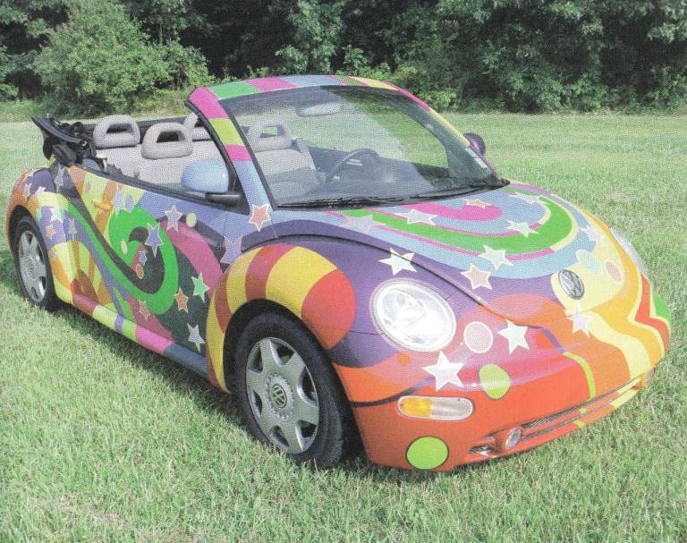 12. A framed magazine original featuring VW/Volkswagen BEETLE SOFT TOP 