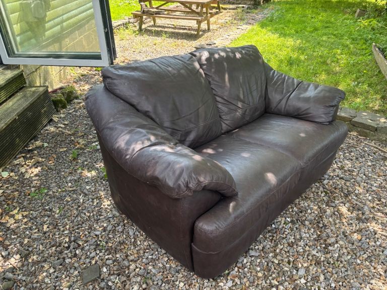 Comfortable Brown Leather Two-Seater Sofa – Good Condition