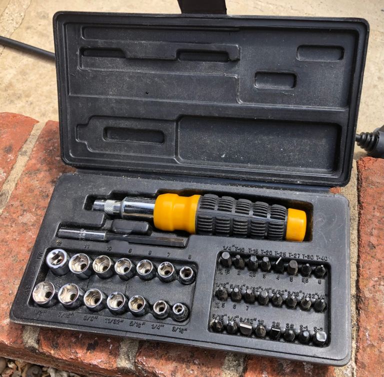 Screwdriver and small sockets set in box.