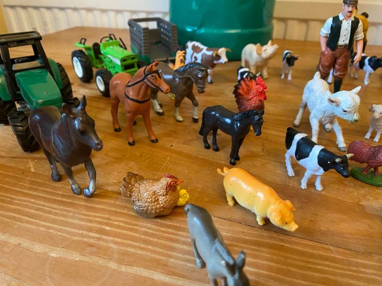 Farm animals, farmers and tractors and dogs toy figures