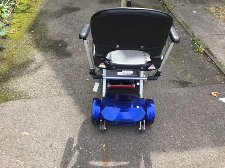 Auto folding electric mobility scooter
