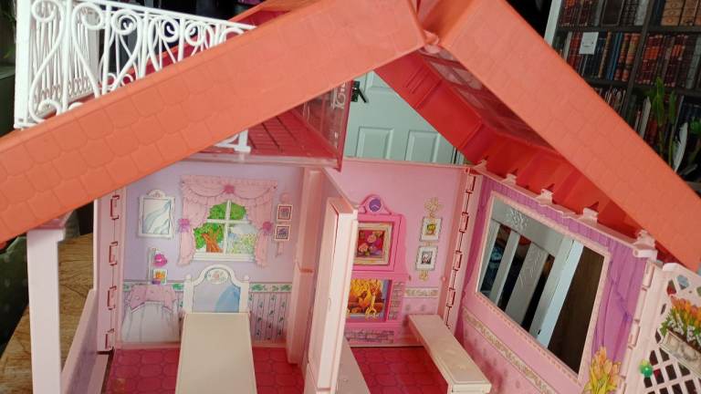 Vintage Barbie fold up houses