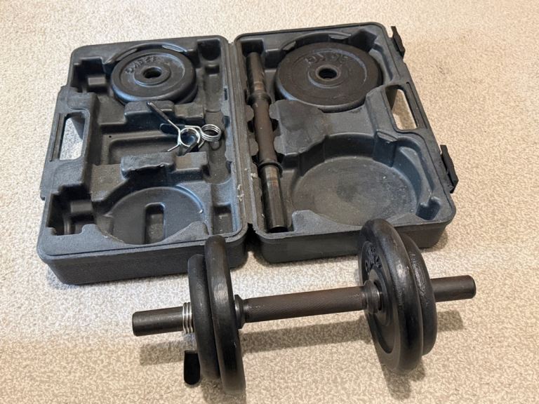 Adjustable Dumbbell Set with Case – Good Condition