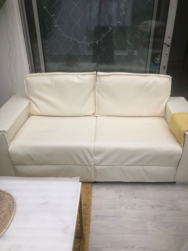 Cream 2 seater sofa