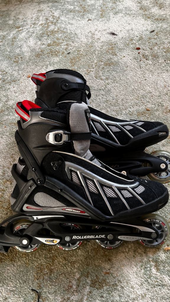 Black Rollerblades UK size 10, with wrist guards 