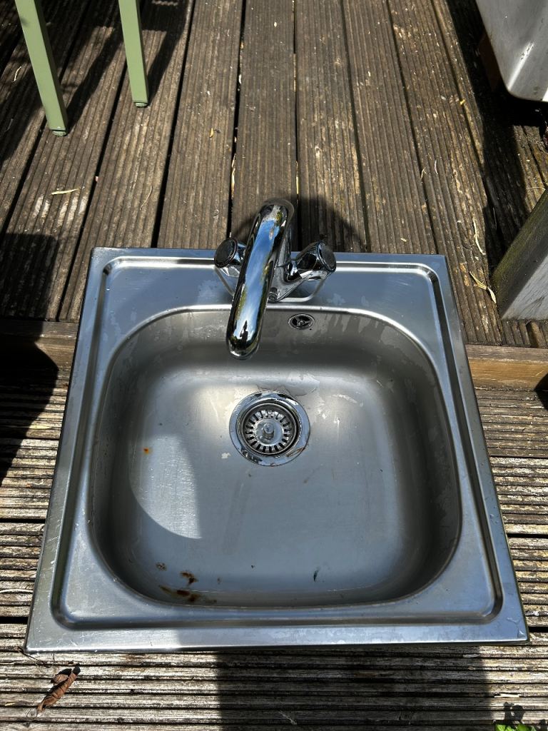 Stainless steel sink and tap