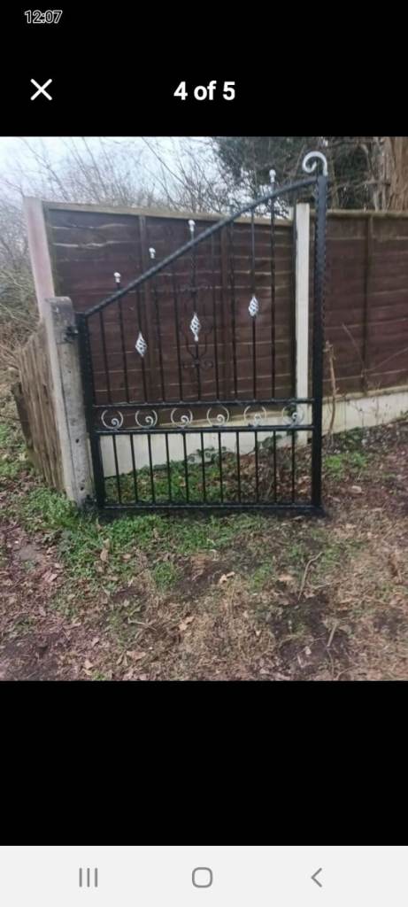 Gold and black iron gate