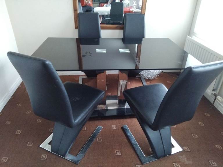 Black glass table and chairs