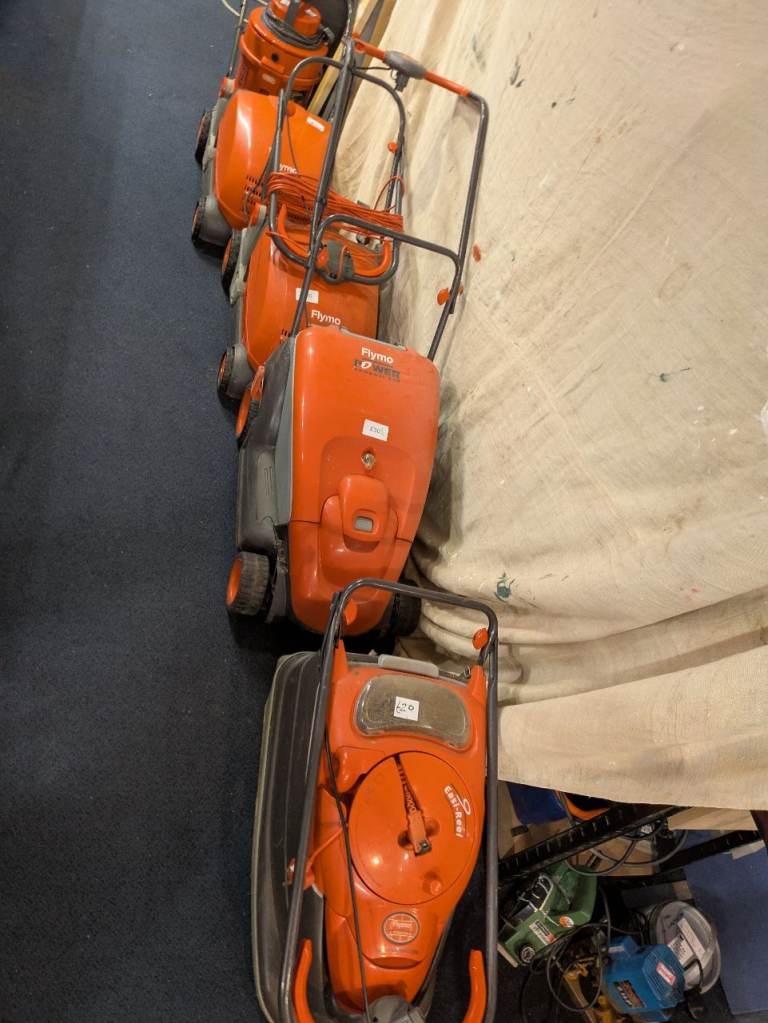 Lawnmowers and scarifier 