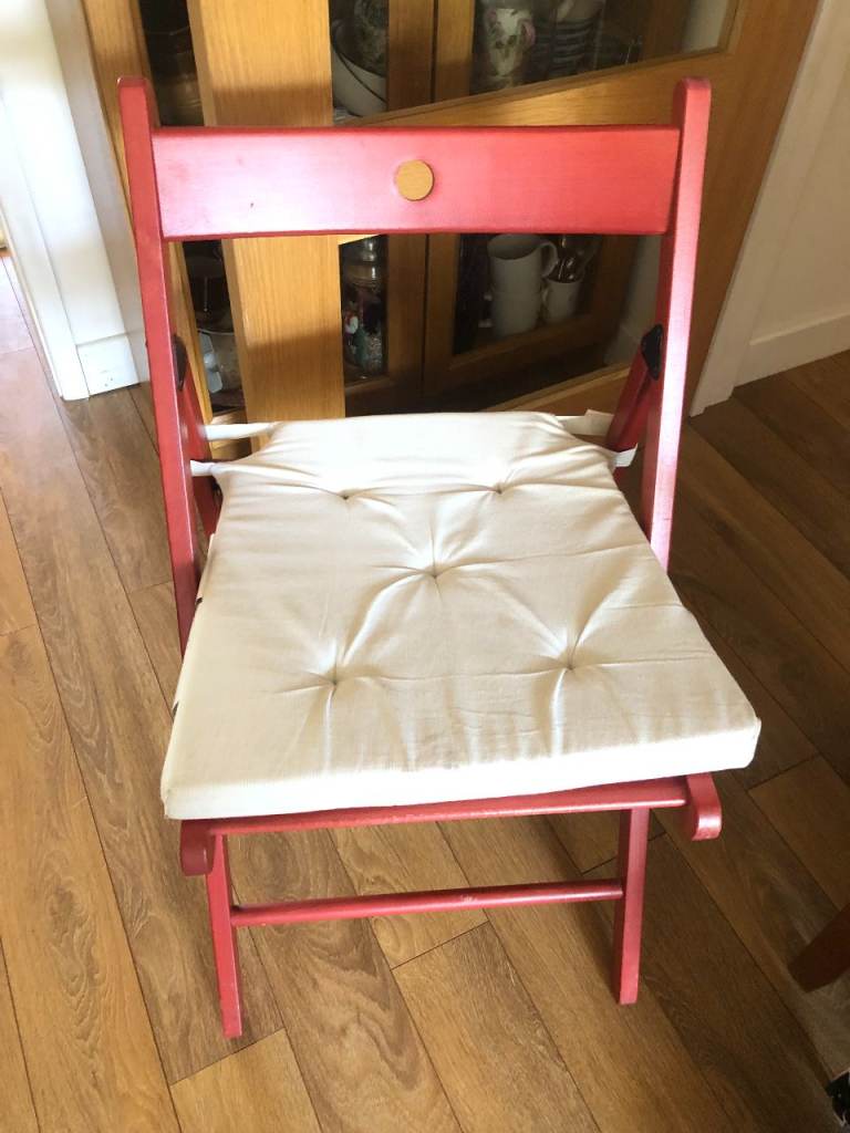 Folding chair with cushion
