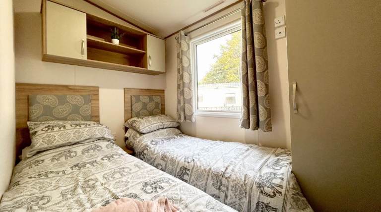 Own a caravan, repaying monthly, near Gt Yarmouth and Lowestoft