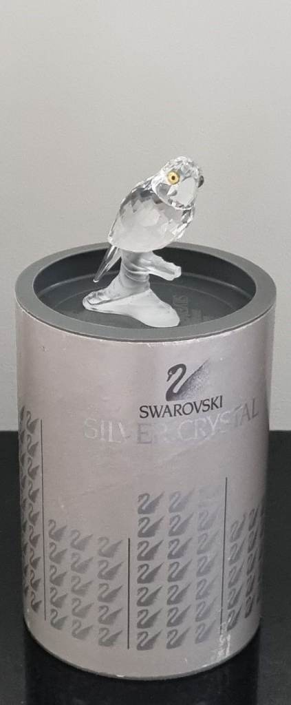 Swarovski parrot on a branch (119443)