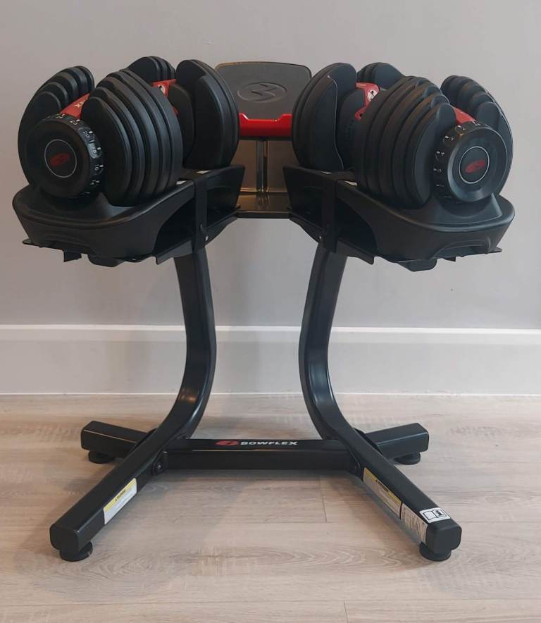 As new Bowflex 552i 2-24kg SelectTech adjustable dumbbells & media stand 
