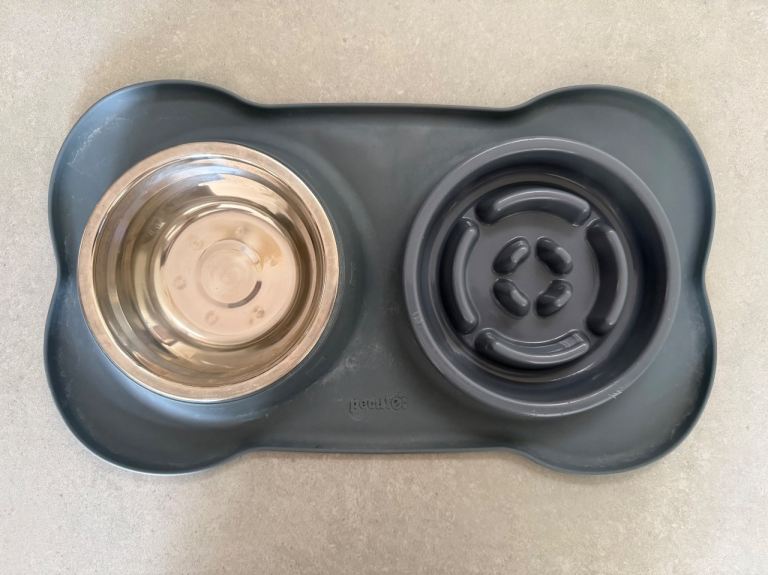Dog food and water bowl combined slow feeder with a rubber matt