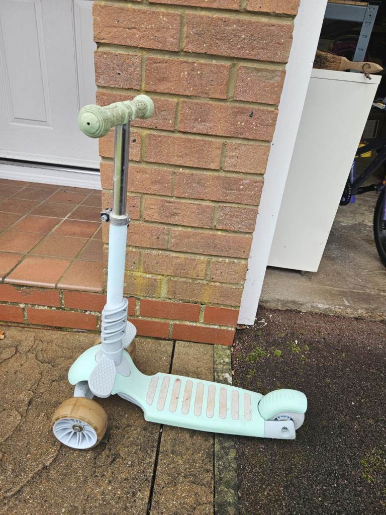 Green 3 wheeled scooter