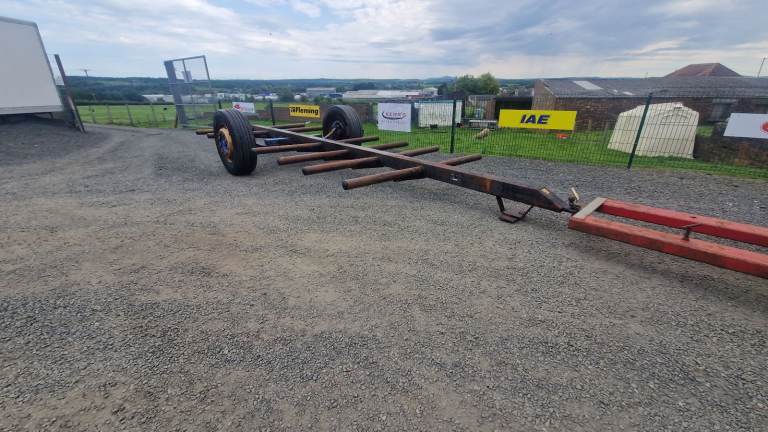 Round bale transport trailer , has super single wheels,  tractor 