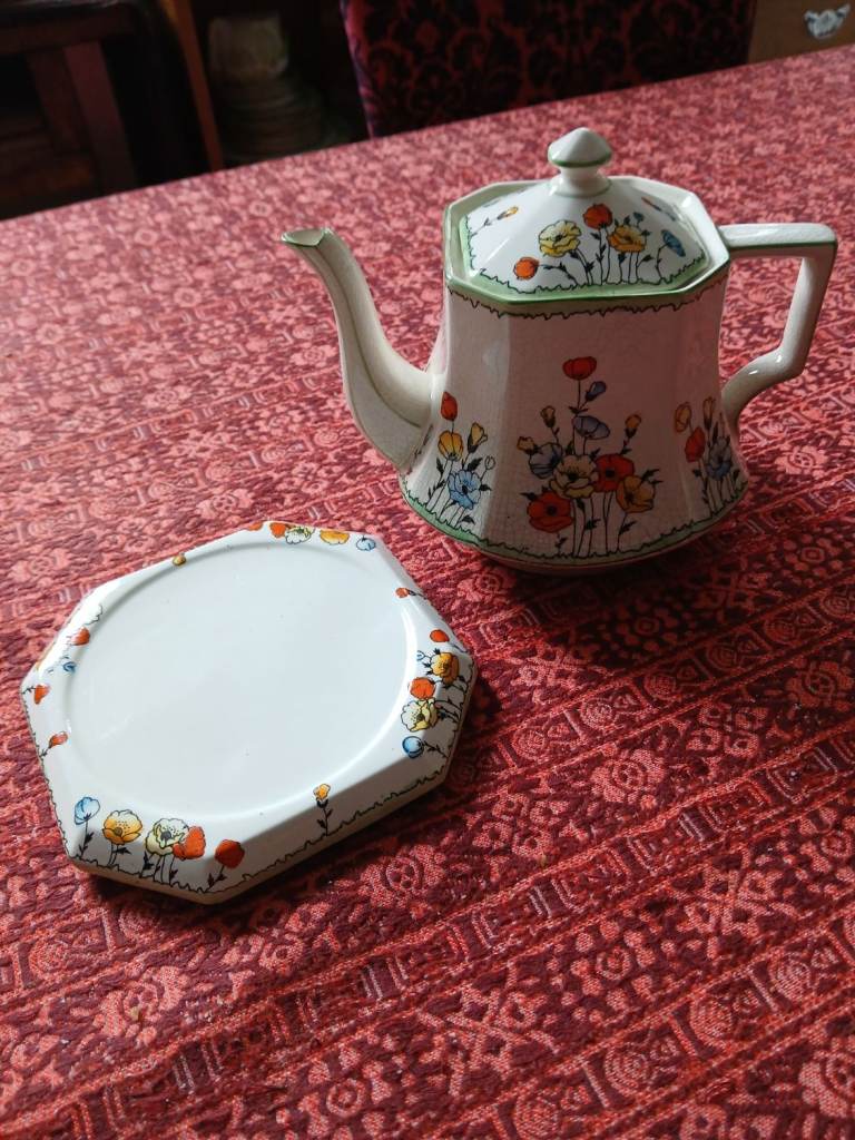 Antique Devon Ware Fieldings 'Poppy' design teapot and stand.  