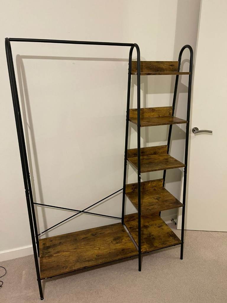 image for Clothing rack with shelving storage for sale 