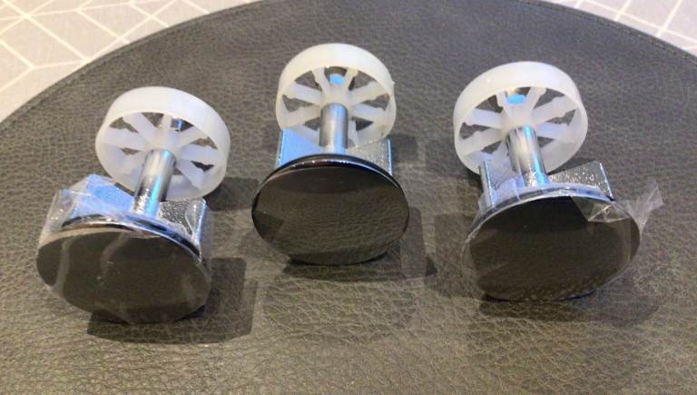 THREE CHROMED POP-UP WASTE PLUGS