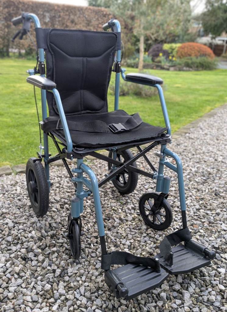 Compact lightweight travel wheelchair