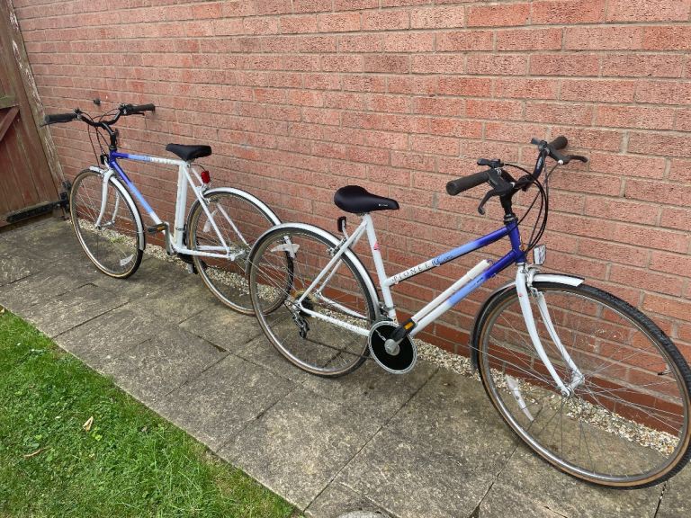 Pair of Vintage Raleigh Pioneer Classic his and her bikes