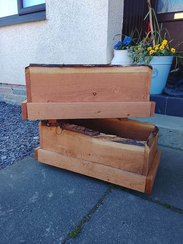 Two rustic wooden planters