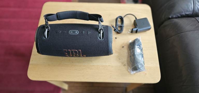 JBL Extreme Stereo portable speaker, complete with charger and extended strap