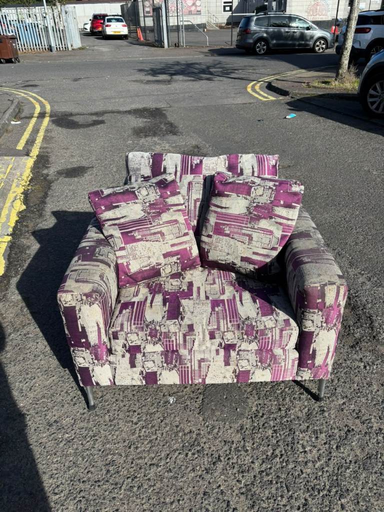 Grey and purple fabric armchair 
