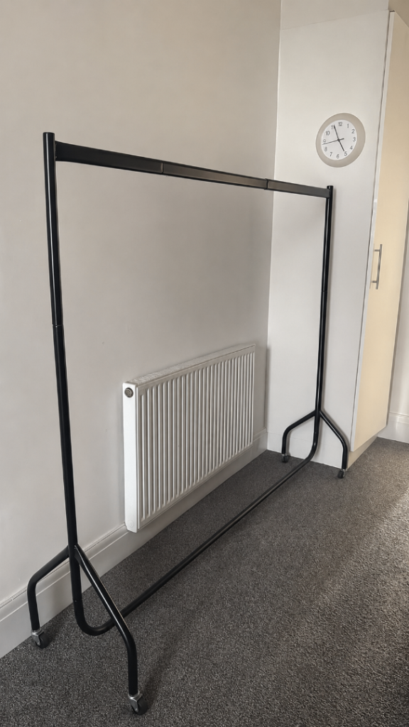 Black Metal Clothes Rail with Wheels – for free