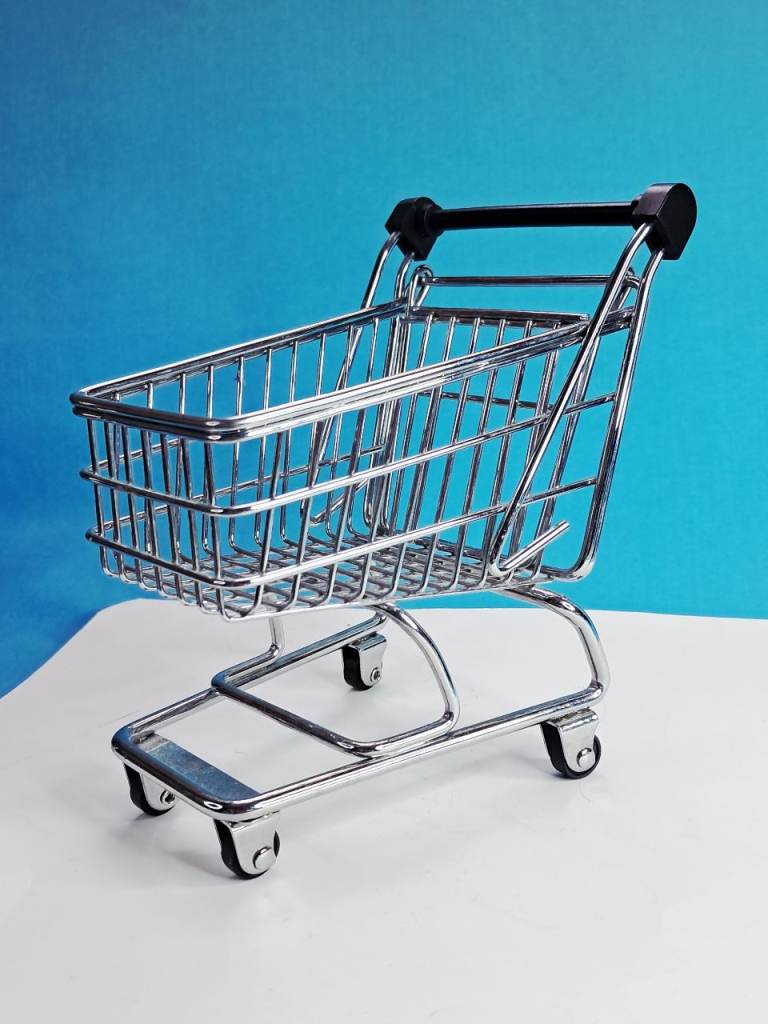 Mini shopping cart or supermarket trolley, often used as a desk organizer or tabletop decoration. 