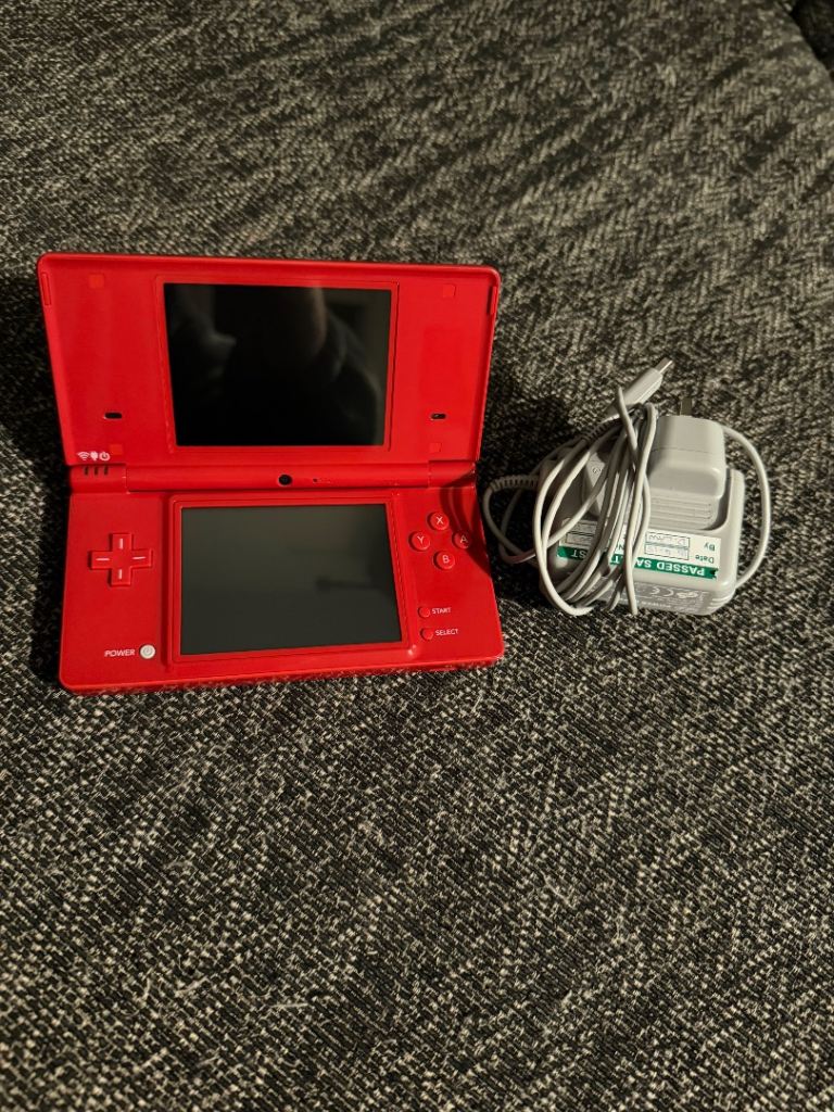 Nintendo DSi with official charger