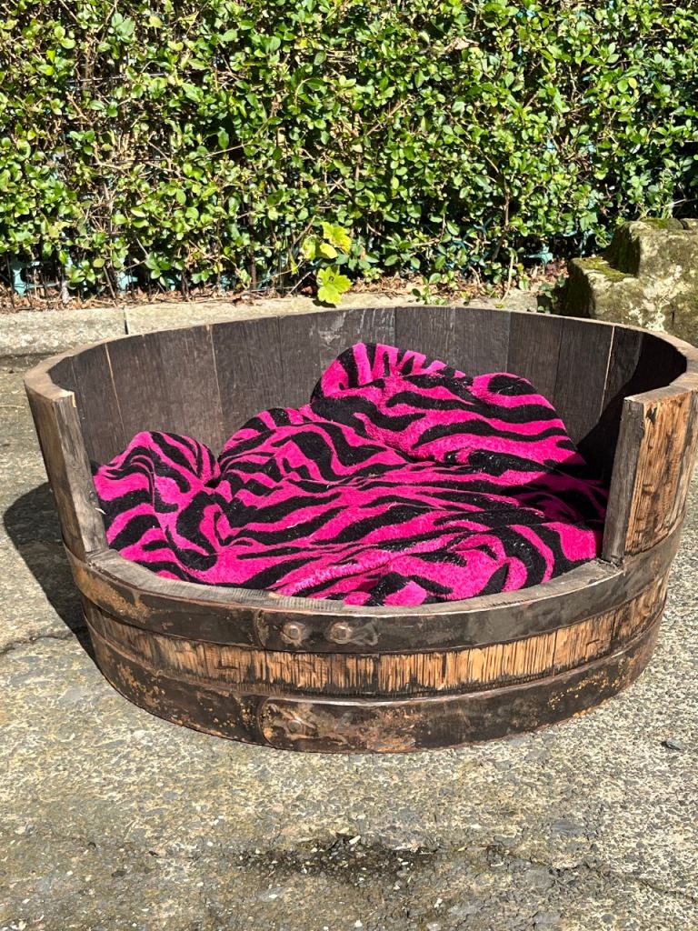 Whiskey barrel dog bed