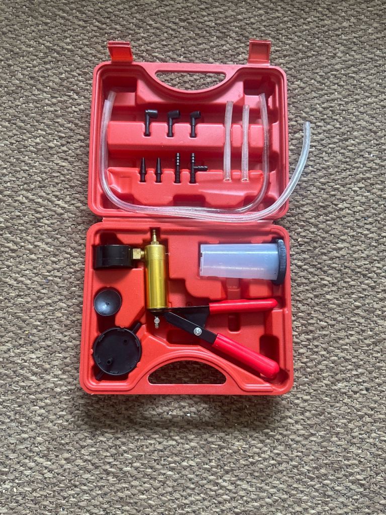 Brake Bleeder Kit with Vacuum Pump – As Good As New