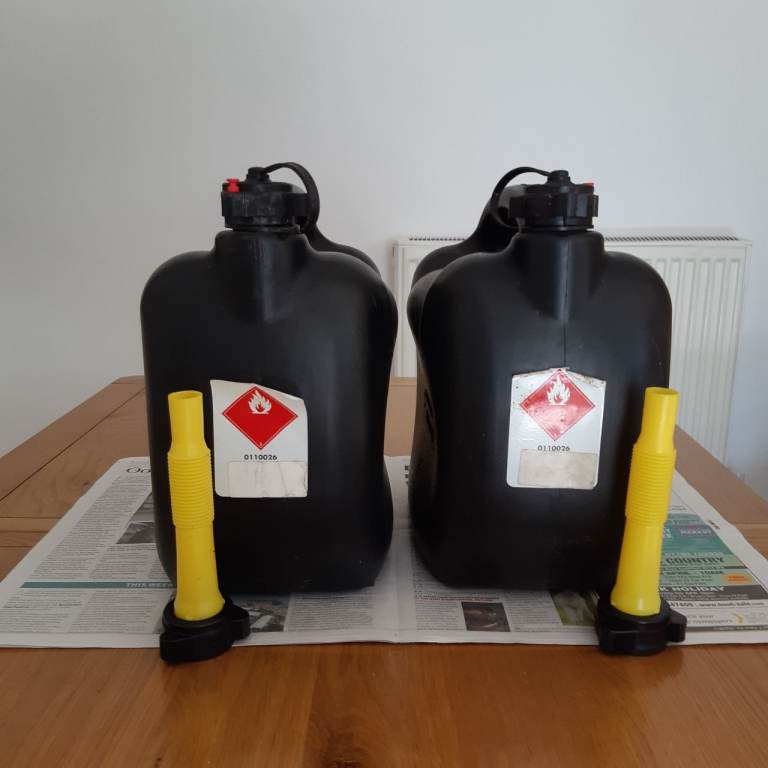 Pair of Black Fuel Cans with Spouts – Good Condition